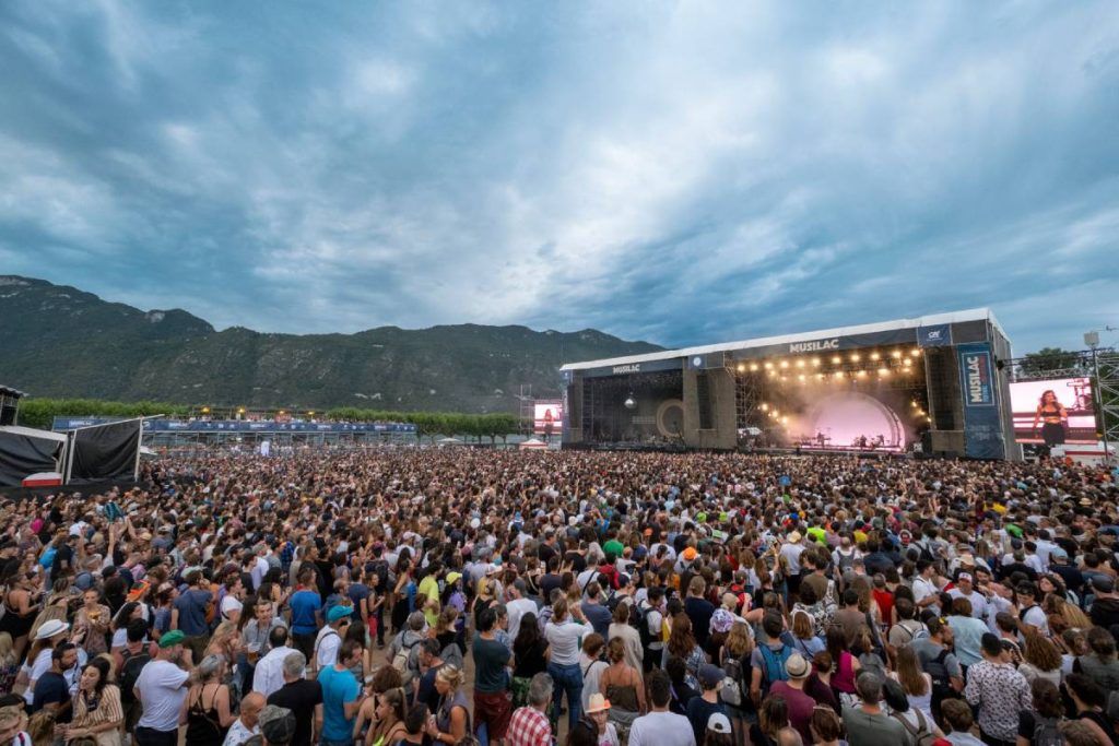 A wide view of the Musilac Festival, featuring two side-by-side main stages, showcasing L-Acoustics K Series live sound systems