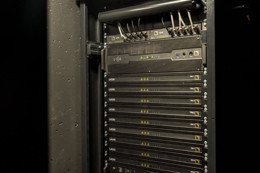 The system is powered by LA2Xi and LA4X amplified controllers while an L-ISA Processor II manages object-based spatialisation.